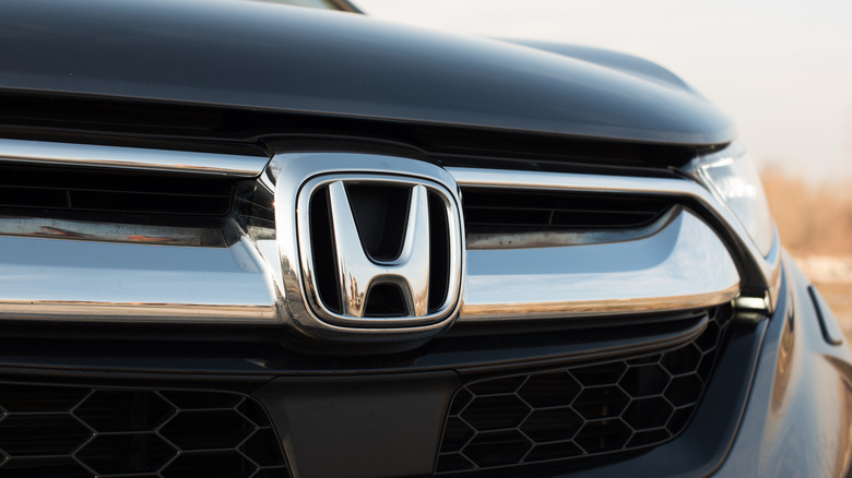 closeup of a Honda badge
