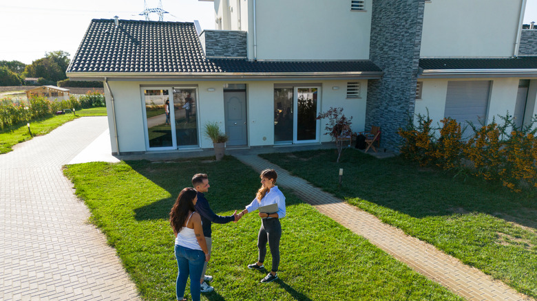couple buying investment property