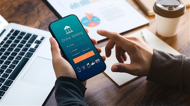 Person mobile banking on app
