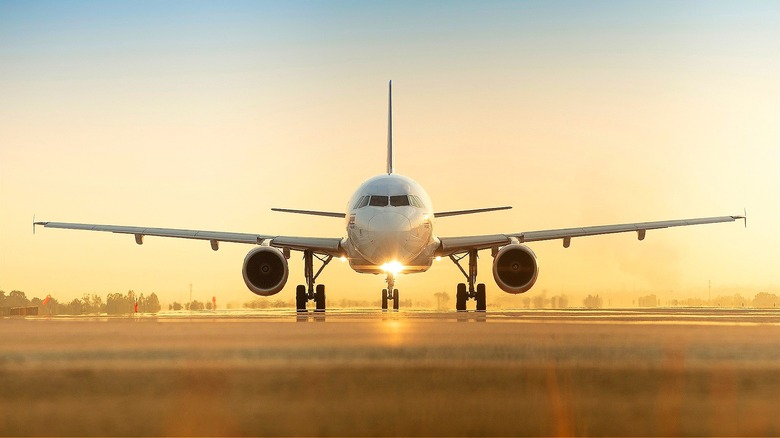 Airplane taxiing on airport runaway