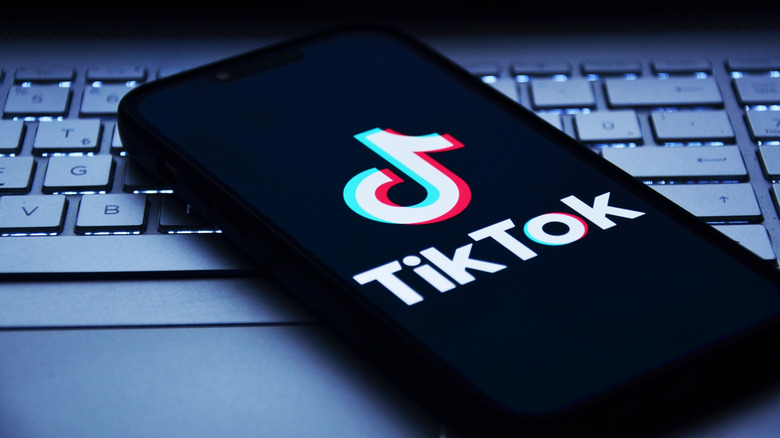 Smartphone showing TikTok logo.