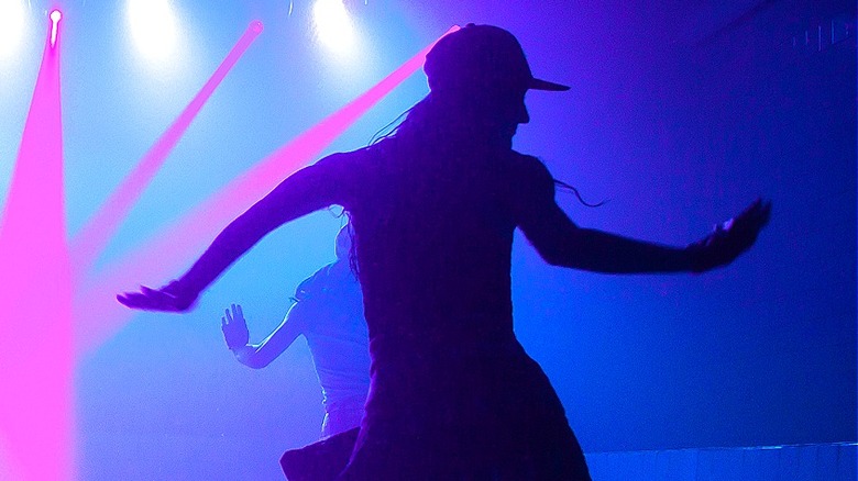 Silhouettes of backup dancers