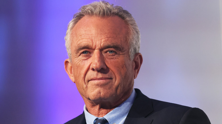 A close-up shot of Robert F. Kennedy Jr grinning