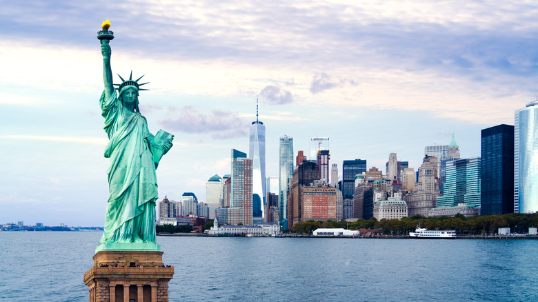 The statue of Liberty with New York City skyline in background