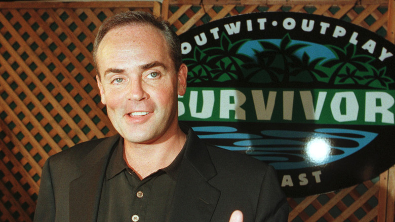 Survivor contestant Richard Hatch smiling for cameras.