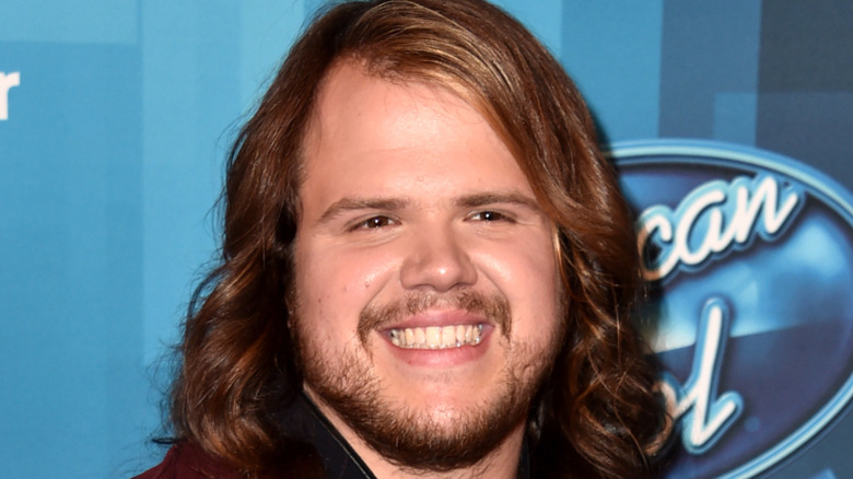 Caleb Johnson smiling at post American-Idol event