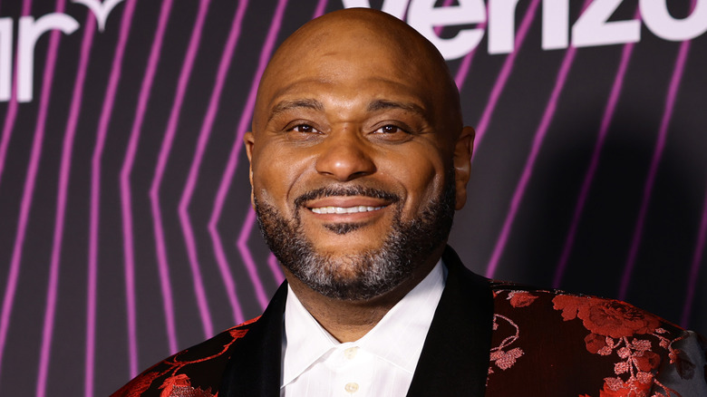 Ruben Studdard standing and smiling