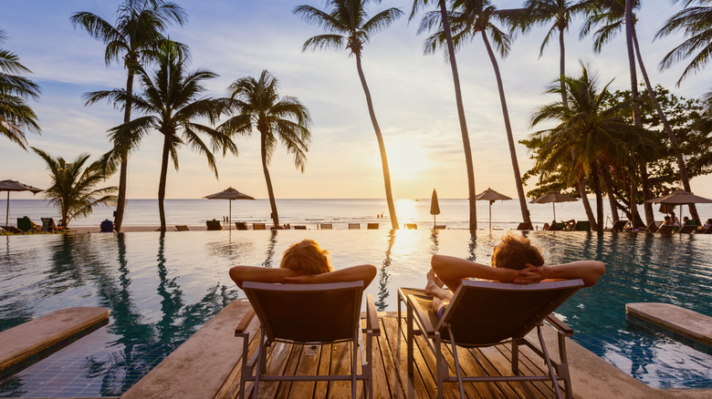 Couple relaxing near a beach.