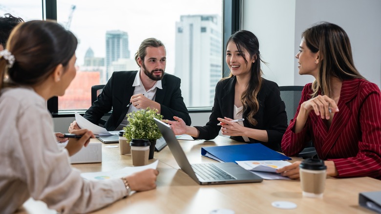 Group of young businessman and woman working in office