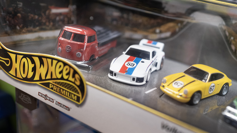 A box containing Hot Wheel miniature model cars
