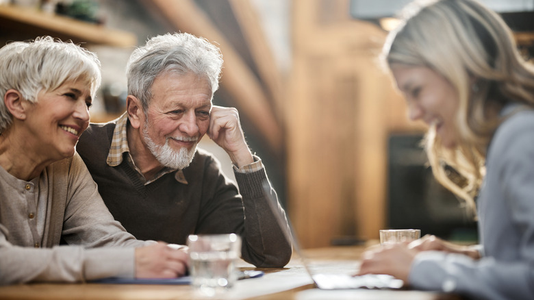 Senior couple meeting with an advisor