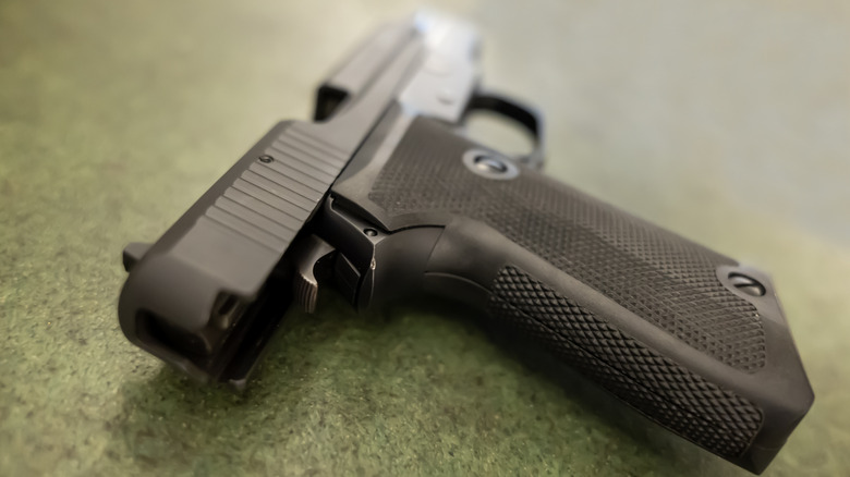 a handgun on a table
