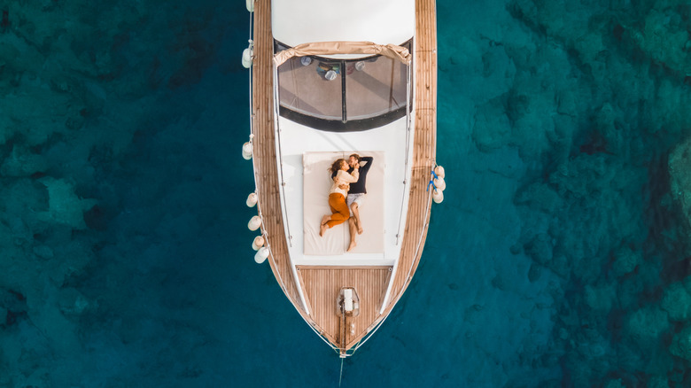 overhead shot of couple on a boat