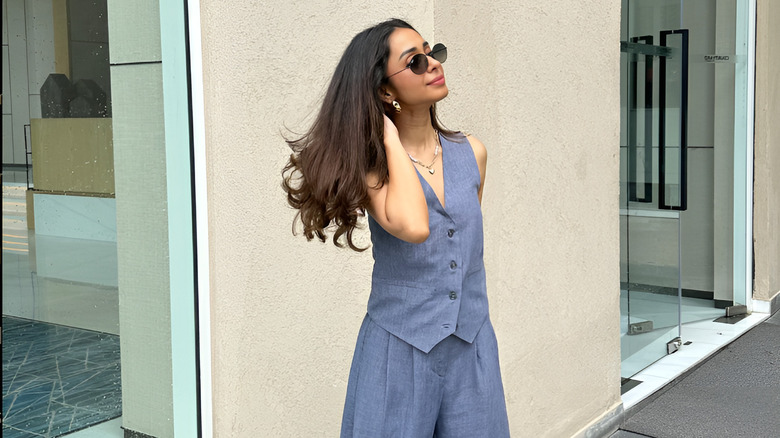 A model waering one of the attores from Armoire's collection