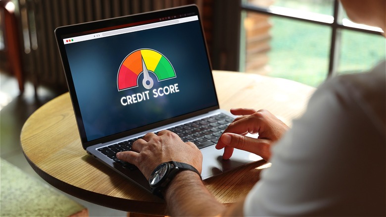 Laptop computer displaying credit score