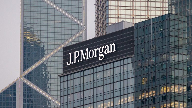 A J.P. Morgan sign against a city skyline