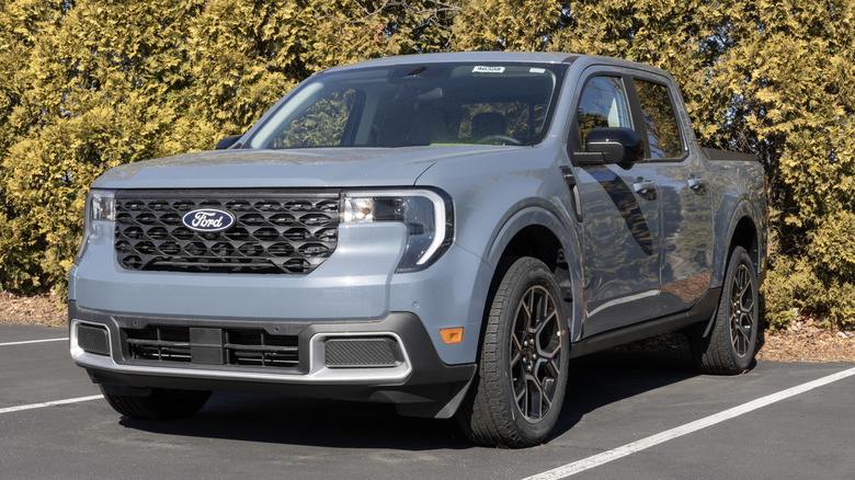 The Ford Maverick Lariat AWD truck display at a dealership.