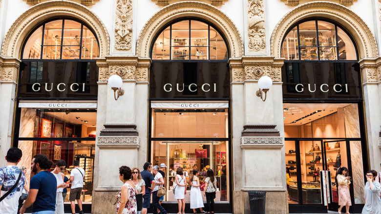 Elegant Gucci store with shoppers in front