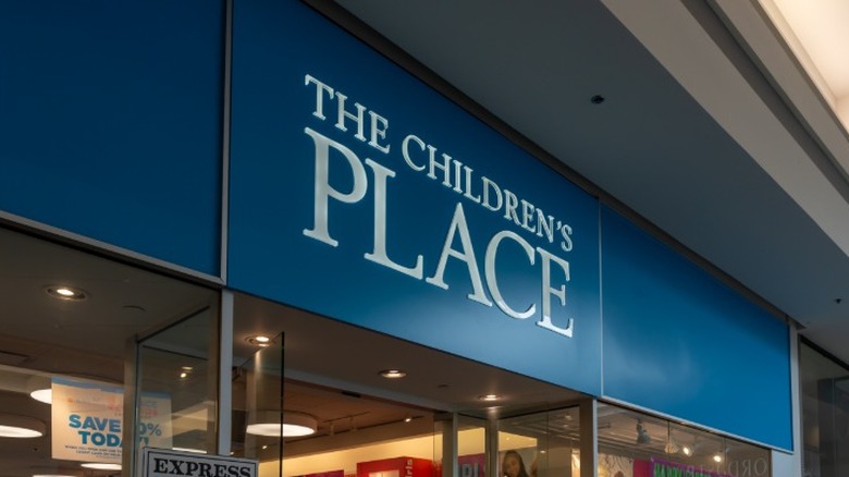 The entrance of a typical The Children's Place store inside of a mall.