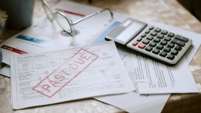 bill with past due stamp across center