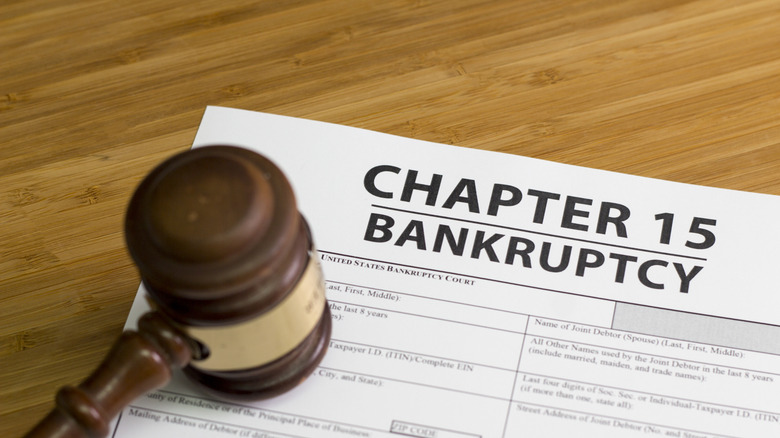 Judge's gavel next to document with words 'Chapter 15 Bankruptcy' on it.