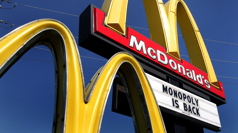 a McDonald's sign advertizing the Monopoly game