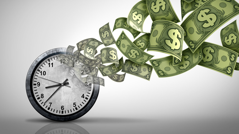 money flying out of clock