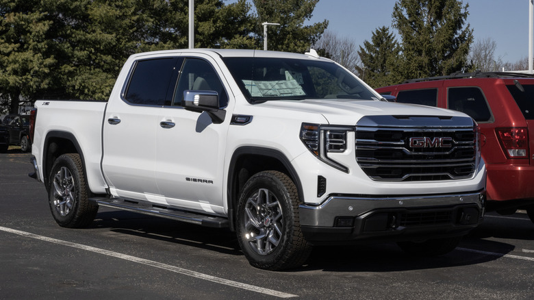 GMC Sierra 1500 4WD SLT truck display.