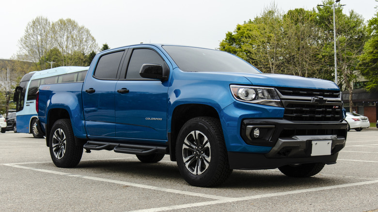 Blue Chevrolet Colorado pickup truck parked in a lot