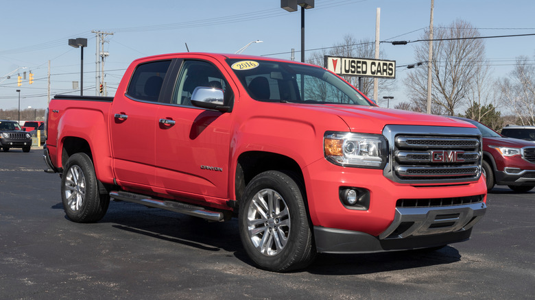 Used GMC Canyon pickup truck on display.