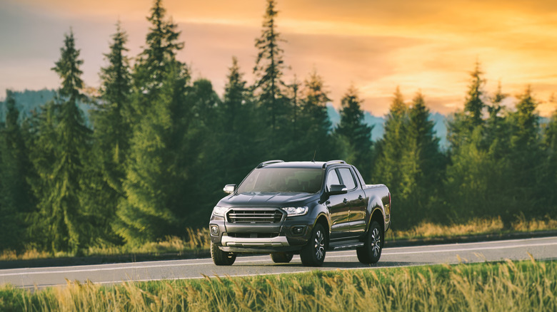 Modern pickup truck on open road