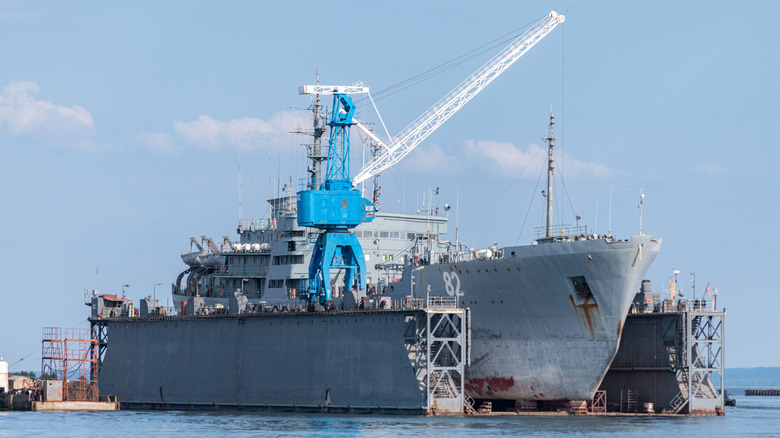 Large Navy ship in shipyard for repair