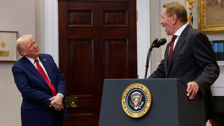 President Donald Trump jokes with Oracle founder Larry Ellison, father of Paramount CEO David Ellison