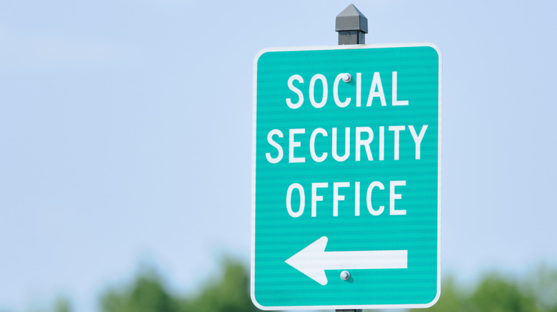 Green direction sign for Social Security Office
