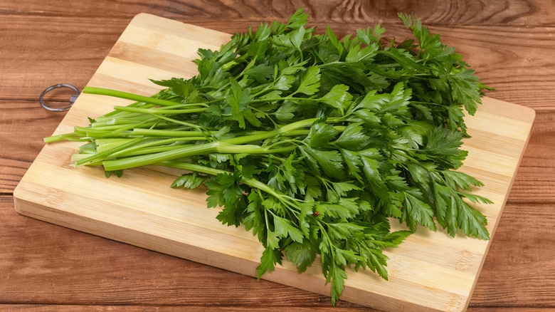 Parsley on a bamboo cutting board
