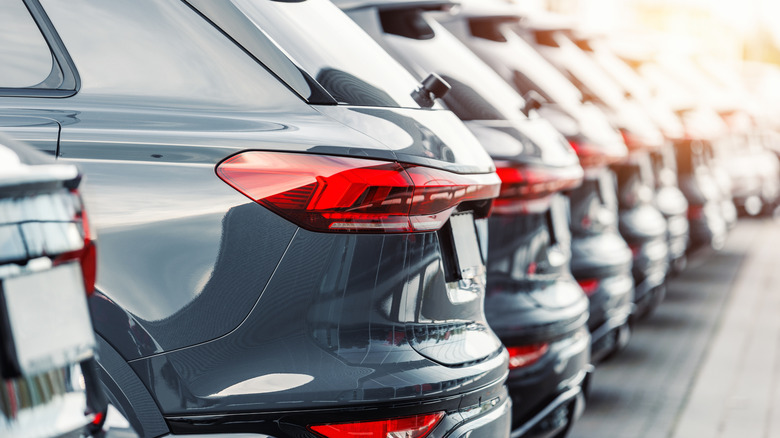 Row of new cars at dealership