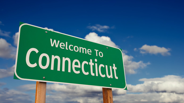 Welcome to Connecticut roadway sign on a sunny day