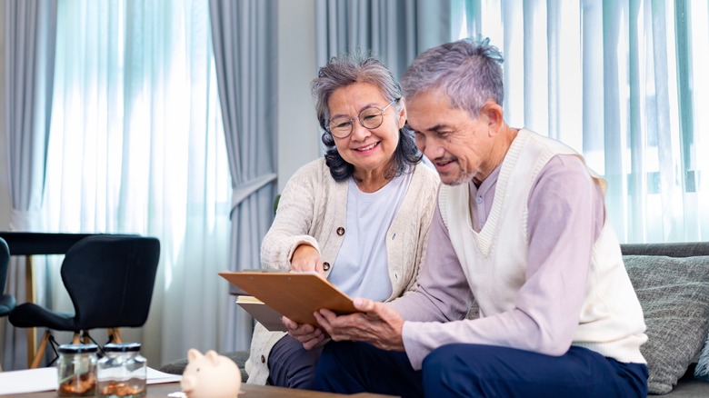 Couple budgeting for retirement.