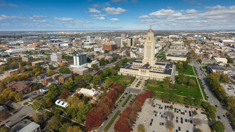 Aerial shot of the Nebraska State Capitol building in downtown Lincoln
