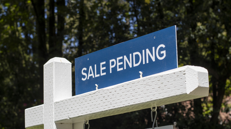 A sale pending sign outside