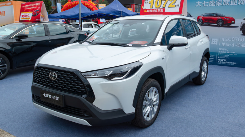A white Toyota Corolla Cross in China