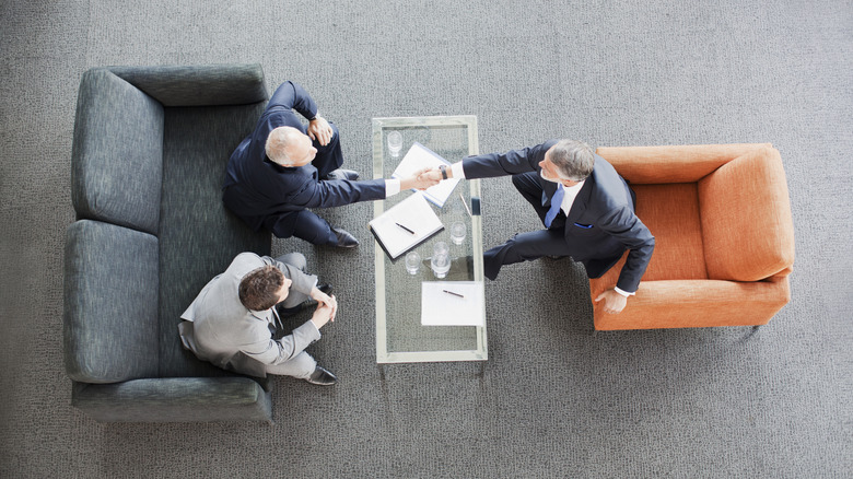 Business partners shaking hands