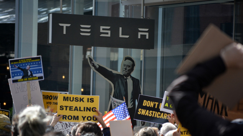 A protest against Elon Musk in front of a Tesla dealership in New York in March 2025.