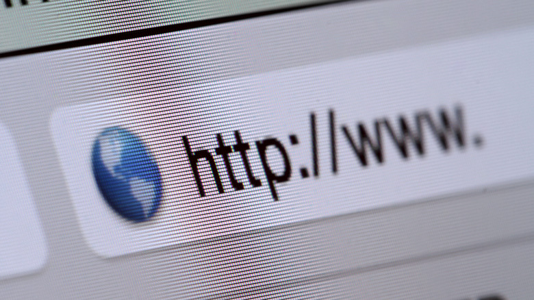 Macro shot of computer screen with http:// address bar and web browser close up image.