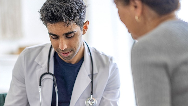 a doctor meeting with patient