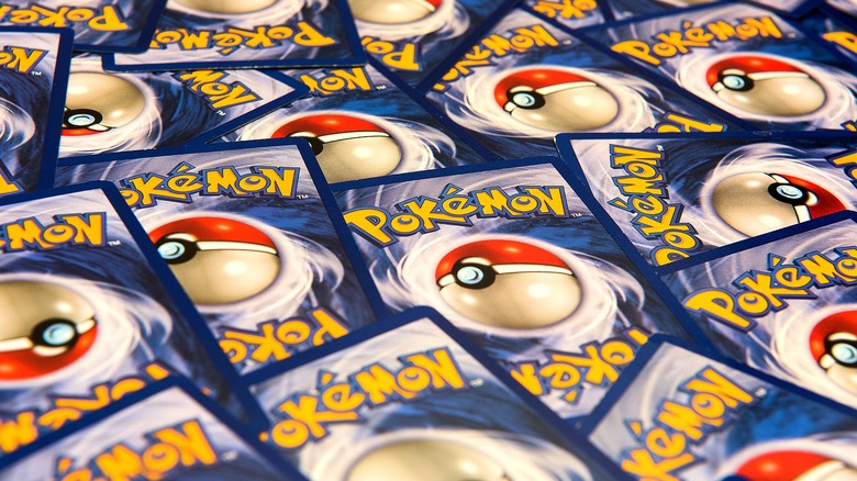 Pokemon cards cover table