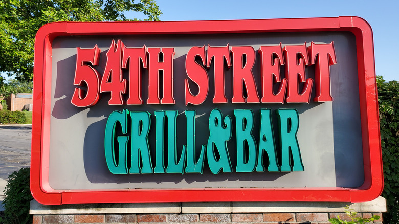 a standalone 54th Street Grill & Bar sign