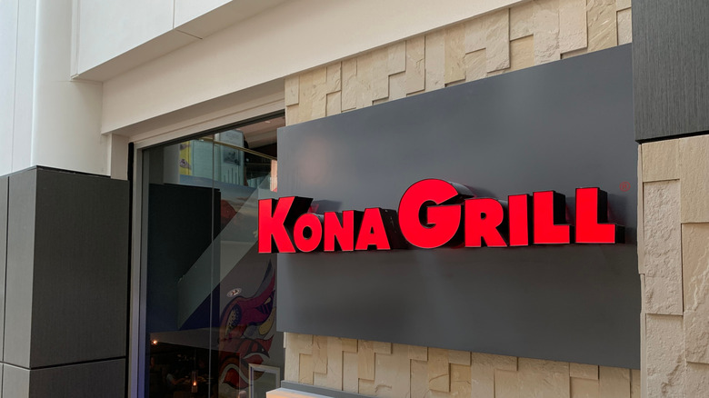 Kona Grill signage posted to exterior wall of the restaurant