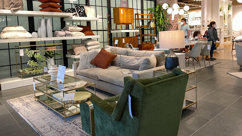 green accent chair and neural sofa