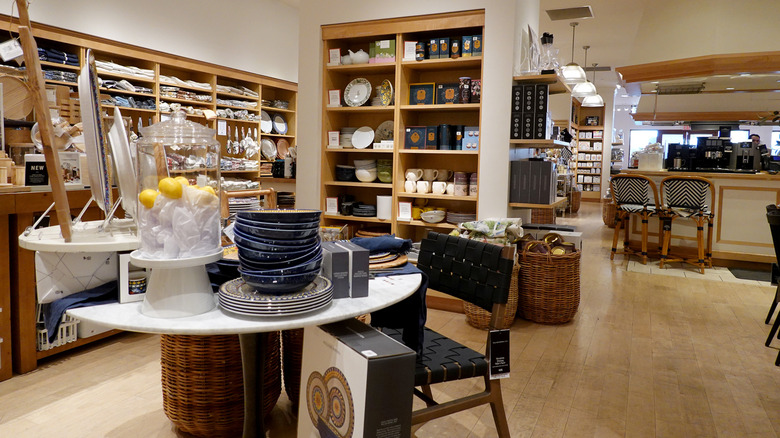 dinnerware stacked on round display table